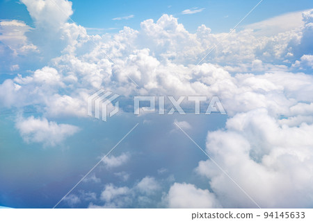Sea of clouds seen from the plane Sea of clouds seen from the plane 94145633