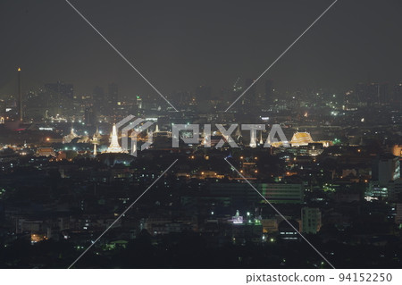 Bangkok cityscape in the middle of the Town, Tele shooting and close up to Wat Arun Ratchawararam Ratchawaramahawihan with Nightscape panorama view. 94152250
