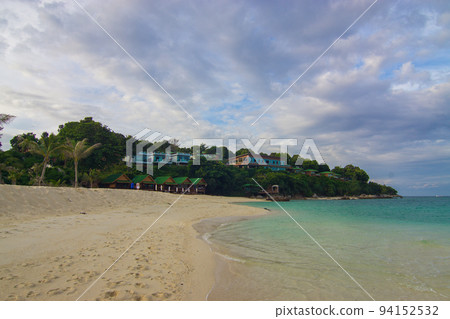 White sand beach tropical sea beach mountain view 94152532