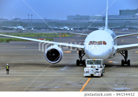 Haneda Airport, Terminal 1, Boeing 787 being towed by an aircraft tractor, Ota Ward, Tokyo (1) Haneda Airport, Terminal 1, Boeing 787 being towed by an aircraft tractor, Ota Ward, Tokyo (1) 94154432