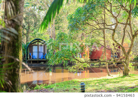 Colorful houses in tents by the water 94158463