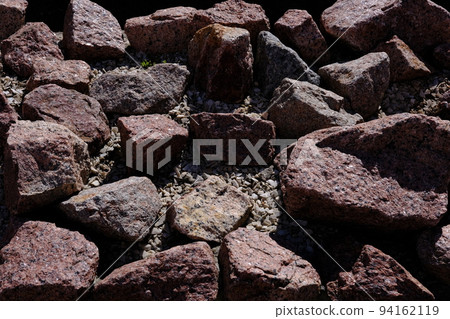 texture of a big stone of red stone 94162119