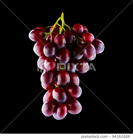 Shiny bunch of ripe backlit grapes isolated on black background Shiny bunch of ripe backlit grapes isolated on black background 94162889