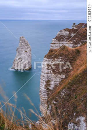 The 'needle rocks' of the Etretat coast rising from the sea at high tide (long exposure) The 'needle rocks' of the Etretat coast rising from the sea at high tide (long exposure) 94163464