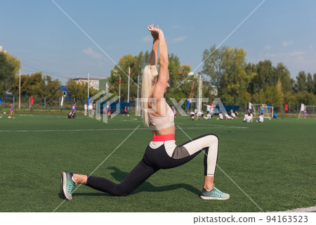 Young sporty woman in sportswear Young sporty woman in sportswear 94163523