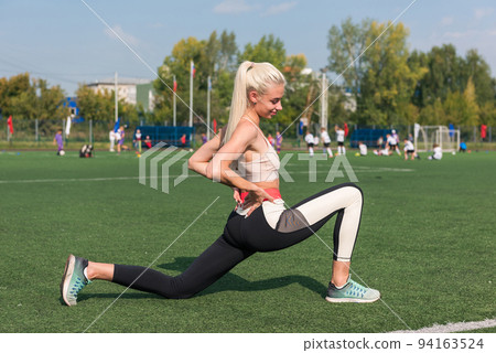 Young sporty woman in sportswear Young sporty woman in sportswear 94163524