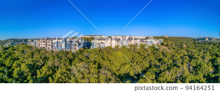 Austin, Texas- Large residential buildings on top of a mountain Austin, Texas- Large residential buildings on top of a mountain 94164251