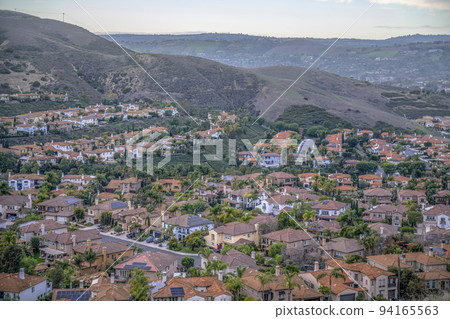 View from a hiking trail of villas on a subdivision at San Clemente, California 94165563