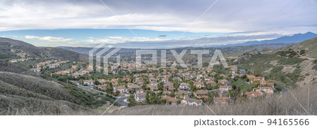 Panoramic view of wealthy neighborhood from a hiking trail at San Clemente, California 94165566