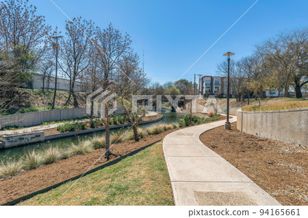 San Antonio, Texas- Concrete walkway beside the river San Antonio, Texas- Concrete walkway beside the river 94165661