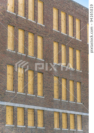 Exterior of an old building with red brick wall in San Antonio Texas downtown 94165819