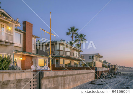 Two-storey houses along the beach at Del Mar Southern California at sunset 94166004