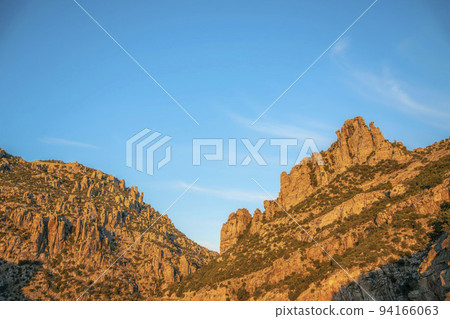 Scenic Santa Catalina Mountain range in Mount Lemmon Arizona against blue sky 94166063