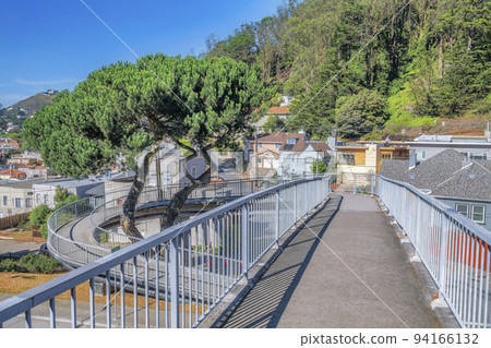 Raised winding footpath overlooking houses in San Francisco California 94166132