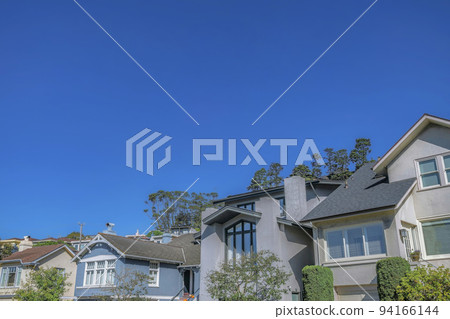 San Francisco California houses with gray and blue walls against clear sky 94166144