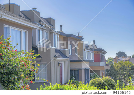 Exterior view of homes on a sunny day in San FranciscoCalifornia neighborhood Exterior view of homes on a sunny day in San FranciscoCalifornia neighborhood 94166145