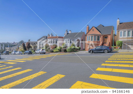 Street view of a residential neighborhood in San Francisco on a sunny day Street view of a residential neighborhood in San Francisco on a sunny day 94166146