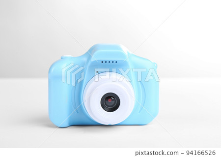 Light blue toy camera isolated on white Light blue toy camera isolated on white 94166526