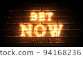 Bet Now glowing fiery inscription on brick wall background. Betting concept. Fire. 3D render. 94168236
