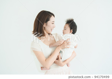 Mom holding a baby Mom holding a baby 94170499