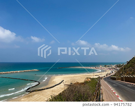 Beach construction in Netanya in Israel. Expansion of the beach area. 94175782