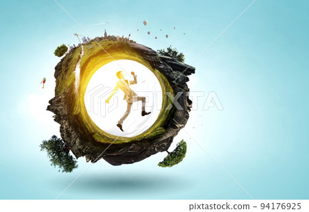 Portrait of energetic businessman jumping in open air 94176925