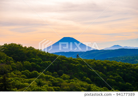 Mt. Yotei where the beautiful ridgeline is fantastically reflected in the sky dyed in the setting sun|Hokkaido Mt. Yotei where the beautiful ridgeline is fantastically reflected in the sky dyed in the setting sun|Hokkaido 94177389