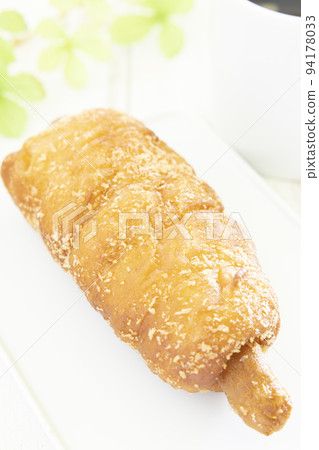 Delicious sausage donuts and coffee Delicious sausage donuts and coffee 94178033