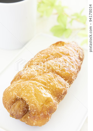 Delicious sausage donuts and coffee 94178034