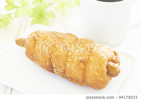 Delicious sausage donuts and coffee Delicious sausage donuts and coffee 94178035