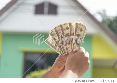 Hand holding loan money dollar bank note give financial payment. Man hands showing spread 100 dollar exchange cash payout. Saving Businessman counting money banknote bribe corruption concept. Hand holding loan money dollar bank note give financial payment. Man hands showing spread 100 dollar exchange cash payout. Saving Businessman counting money banknote bribe corruption concept. 94178044