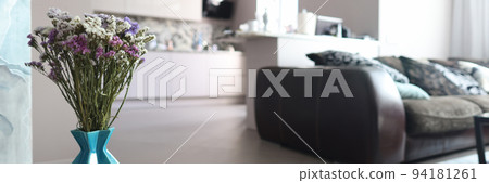 Vase with colorful flowers in interior of apartment Vase with colorful flowers in interior of apartment 94181261