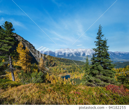 Calm autumn Alps mountain lake with clear transparent water and reflections. Untersee lake, Reiteralm, Steiermark, Austria. 94182255