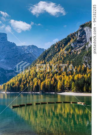 Autumn peaceful alpine lake Braies or Pragser Wildsee. Fanes-Sennes-Prags national park, South Tyrol, Dolomites Alps, Italy, Europe. Picturesque traveling, seasonal and nature beauty concept scene. 94182285