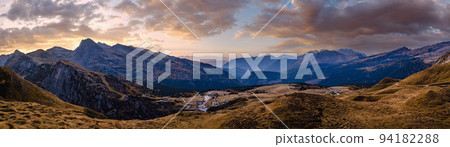 Evening dusk autumn Dolomites panoramic Rolle Pass view, Trento, Italy. 94182288