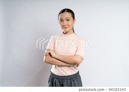 Asian woman happy confident standing crossed arms, looking at camera. 94183143