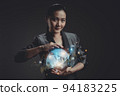 Asian woman showing a growing virtual hologram of statistics, graph and chart. 94183225