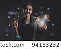 Woman using a smart phone with virtual reality technology of metaverse, internet of things concepts. 94183232