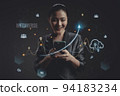 Woman using a smart phone with virtual reality technology of metaverse, internet of things concepts. 94183234
