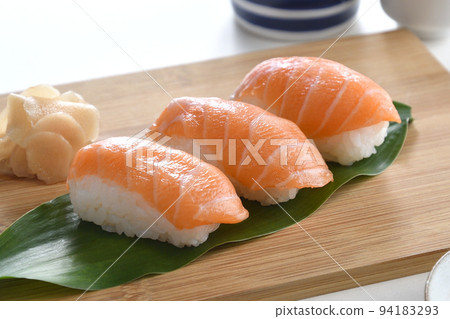 Salmon nigiri sushi sanuki and sake Salmon nigiri sushi sanuki and sake 94183293