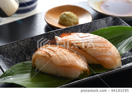 Grilled salmon nigiri sushi 94183295
