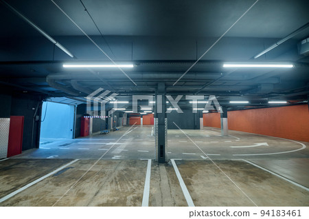 Modern underground garage in the warehouse facility Modern underground garage in the warehouse facility 94183461