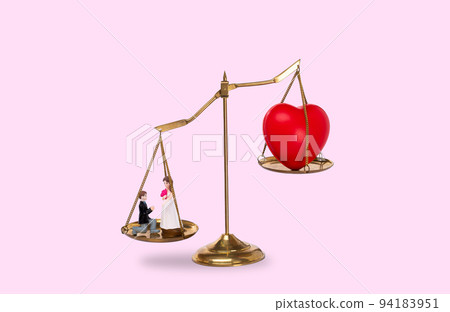 Love Money Symbol Concept. Red Heart shape on balance scale exchange trade for Materialism, bride groom and buy sale lover. Love for money on balance scale isolated on pink background 94183951