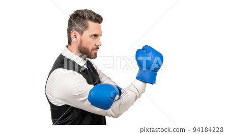 businessman in boxing gloves. punching. successful ceo boxer. relentless struggle and success 94184228