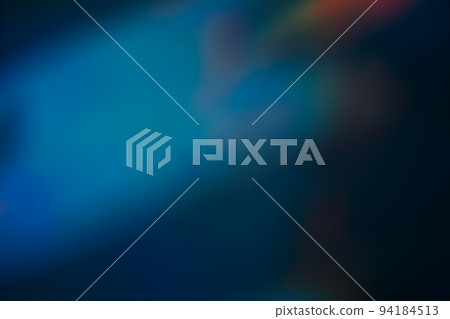 Blur light leak. Lens flare. Bokeh rays. Optical radiance. Defocused blue red color beam glow on dark night abstract copy space background. 94184513