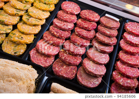 hamburguesa assort on counter 94185606