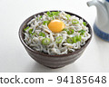 Fried whitebait rice bowl topped with egg (white background) 94185648