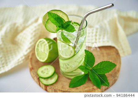 Cucumber, lime and mint lemonade. Refresment summer drink, Glass of detox water for dieting 94186444