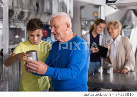 Grandparents and kids in escape room 94186810