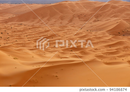 Erg Chebbi dunes in the Sahara Desert. Morocco Erg Chebbi dunes in the Sahara Desert. Morocco 94186874